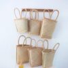 Hand woven palm handbags
