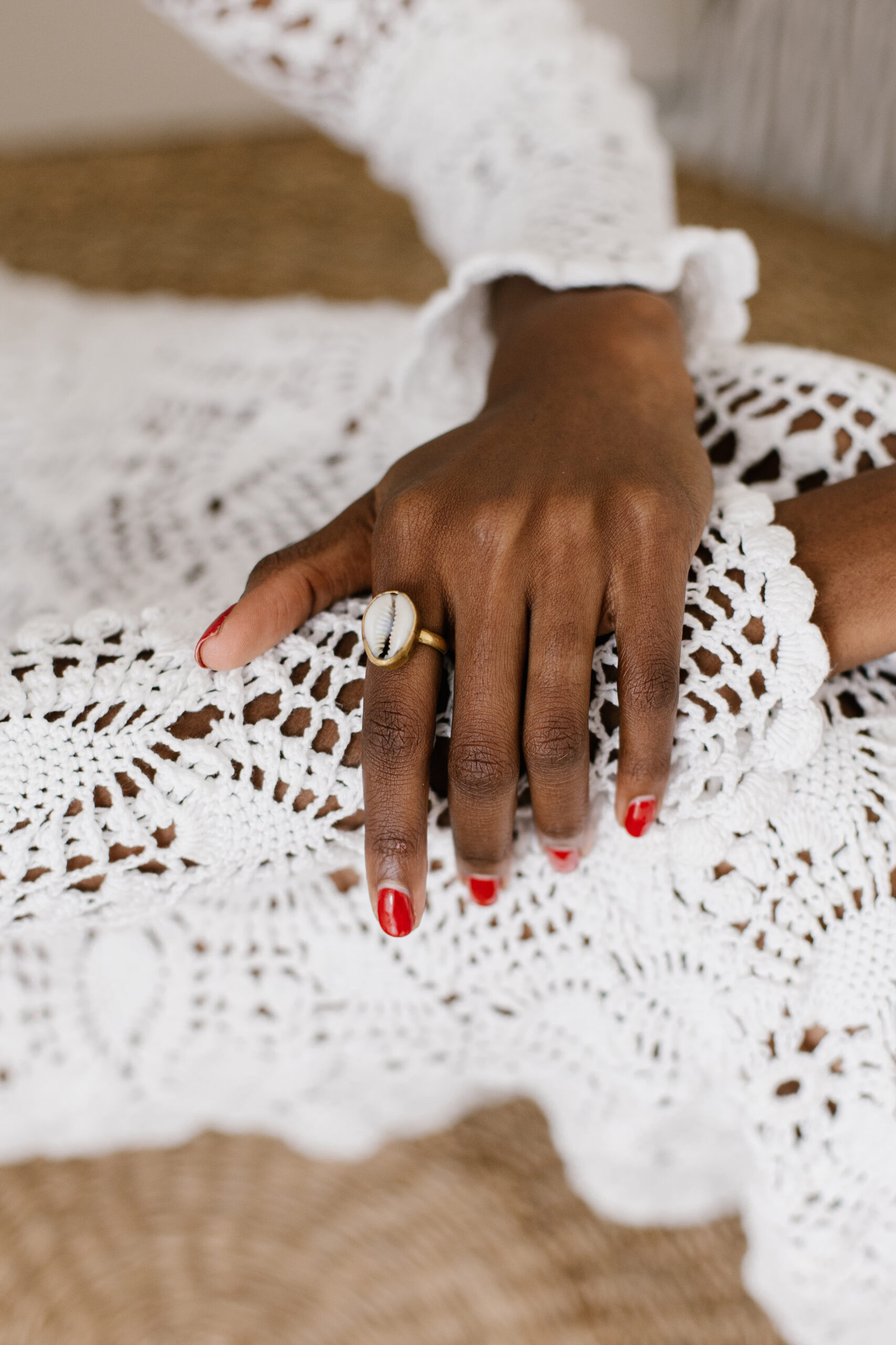 Seychelles crochet dress, cowrie brass ring